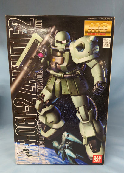 Bandai MG 1/100 Mobile Suit RFTERM0TOKEN 0083 Stardust Memory Zaku II F2 Typ/Zeon Farbe