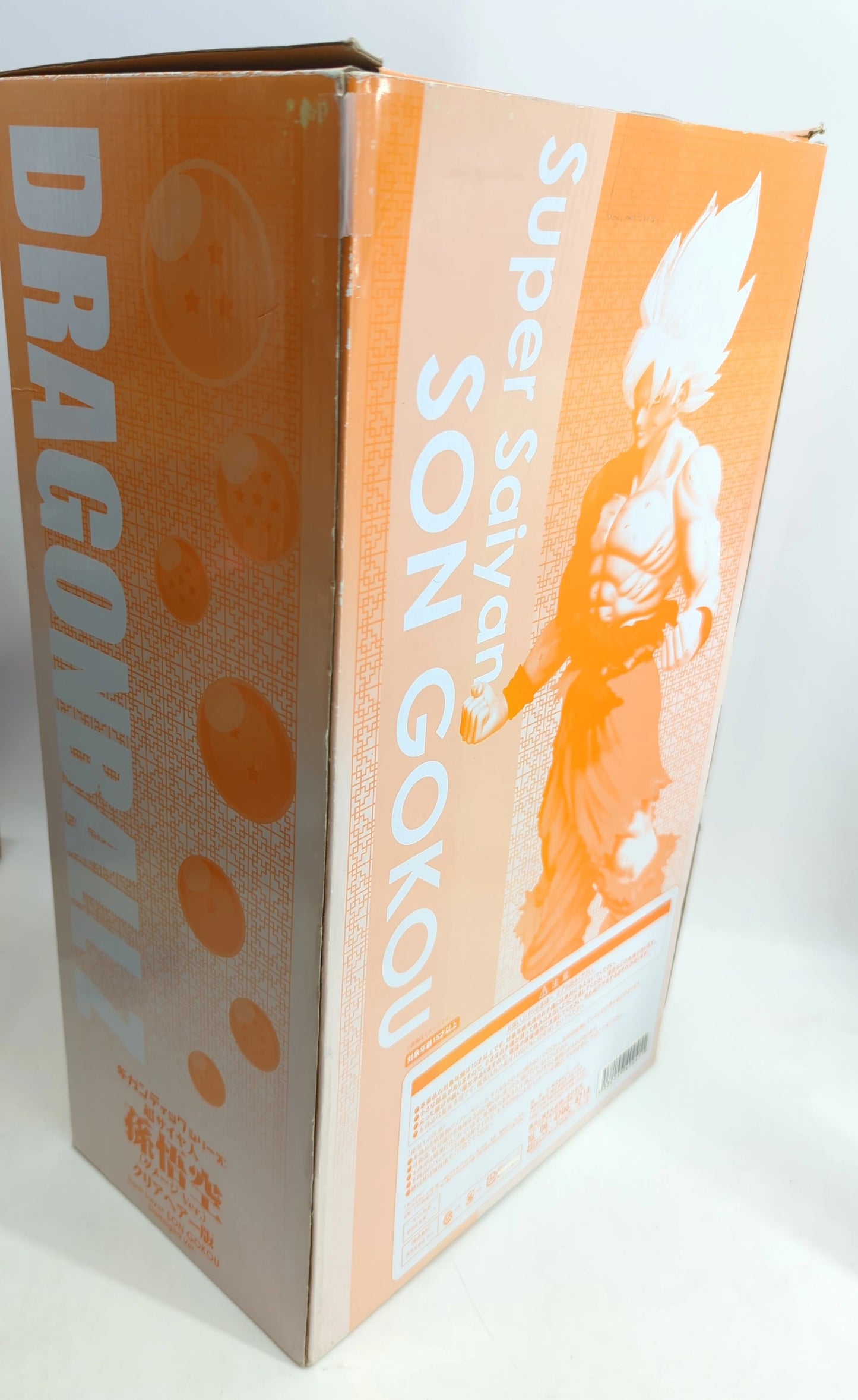 X-plus Gigantic series Super Saiyan Son Goku Damage Ver. Clear Hair Version