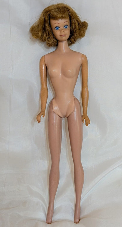 Mattel Vintage Barbie Midge, with freckles/closed mouth, red hair, pink dress.