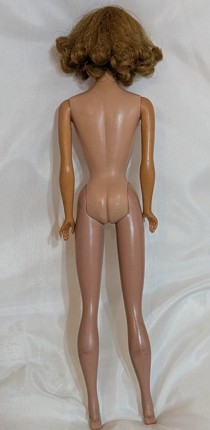 Mattel Vintage Barbie Midge, with freckles/closed mouth, red hair, pink dress.
