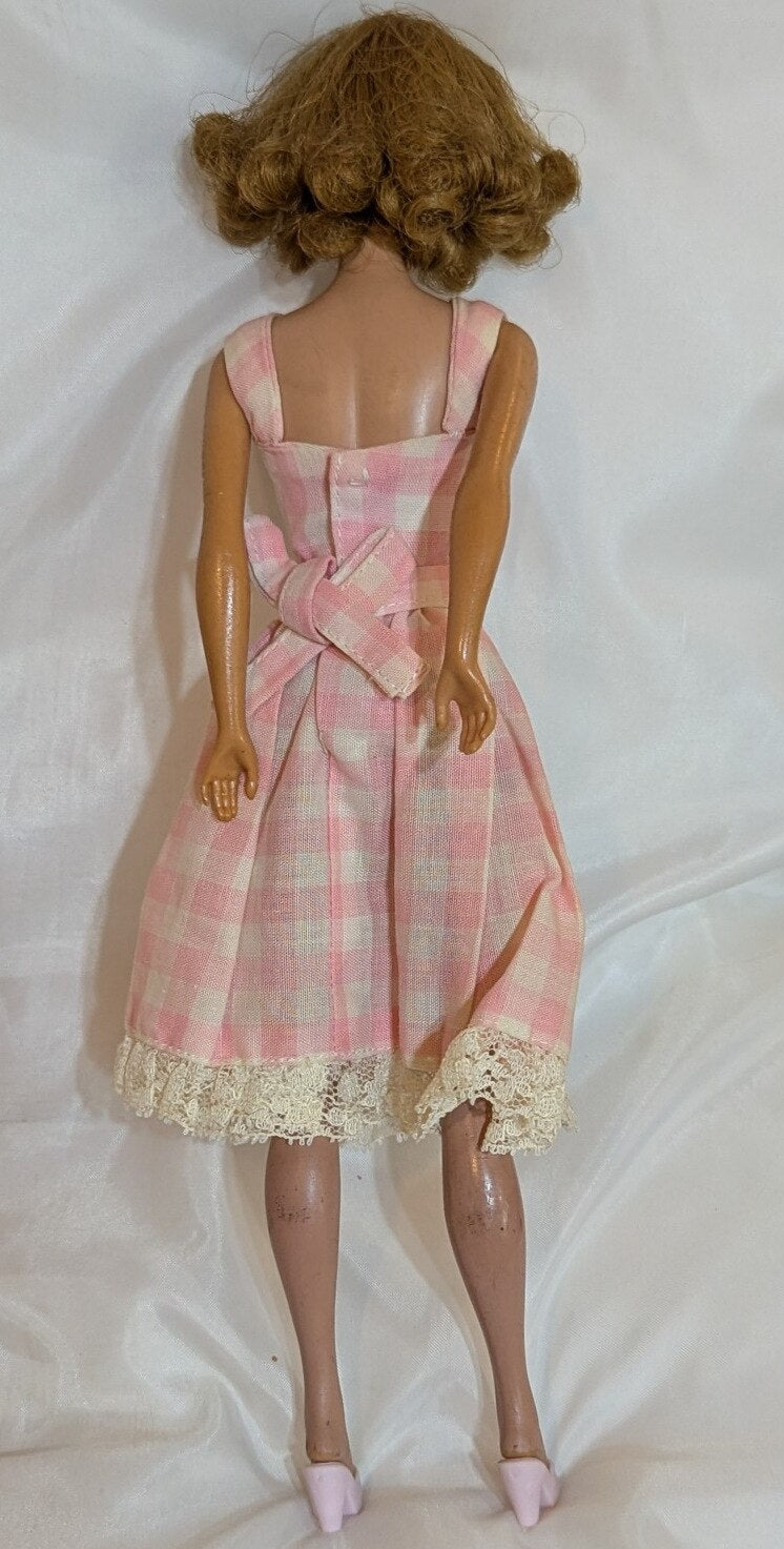 Mattel Vintage Barbie Midge, with freckles/closed mouth, red hair, pink dress.